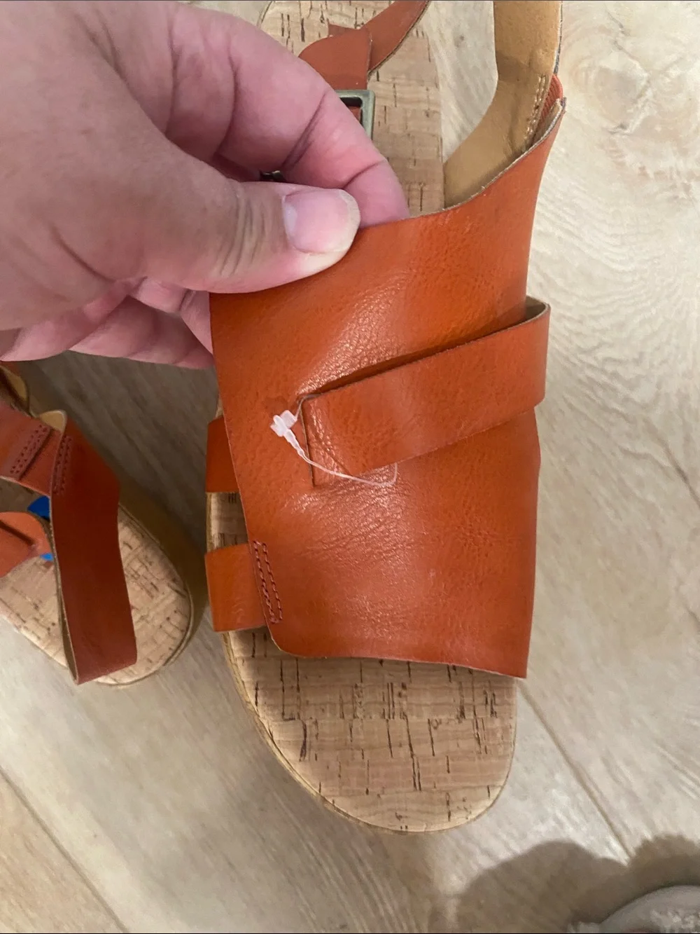 Women’s Korks platform wedge sandals feature a cork sole slingback buckle.
